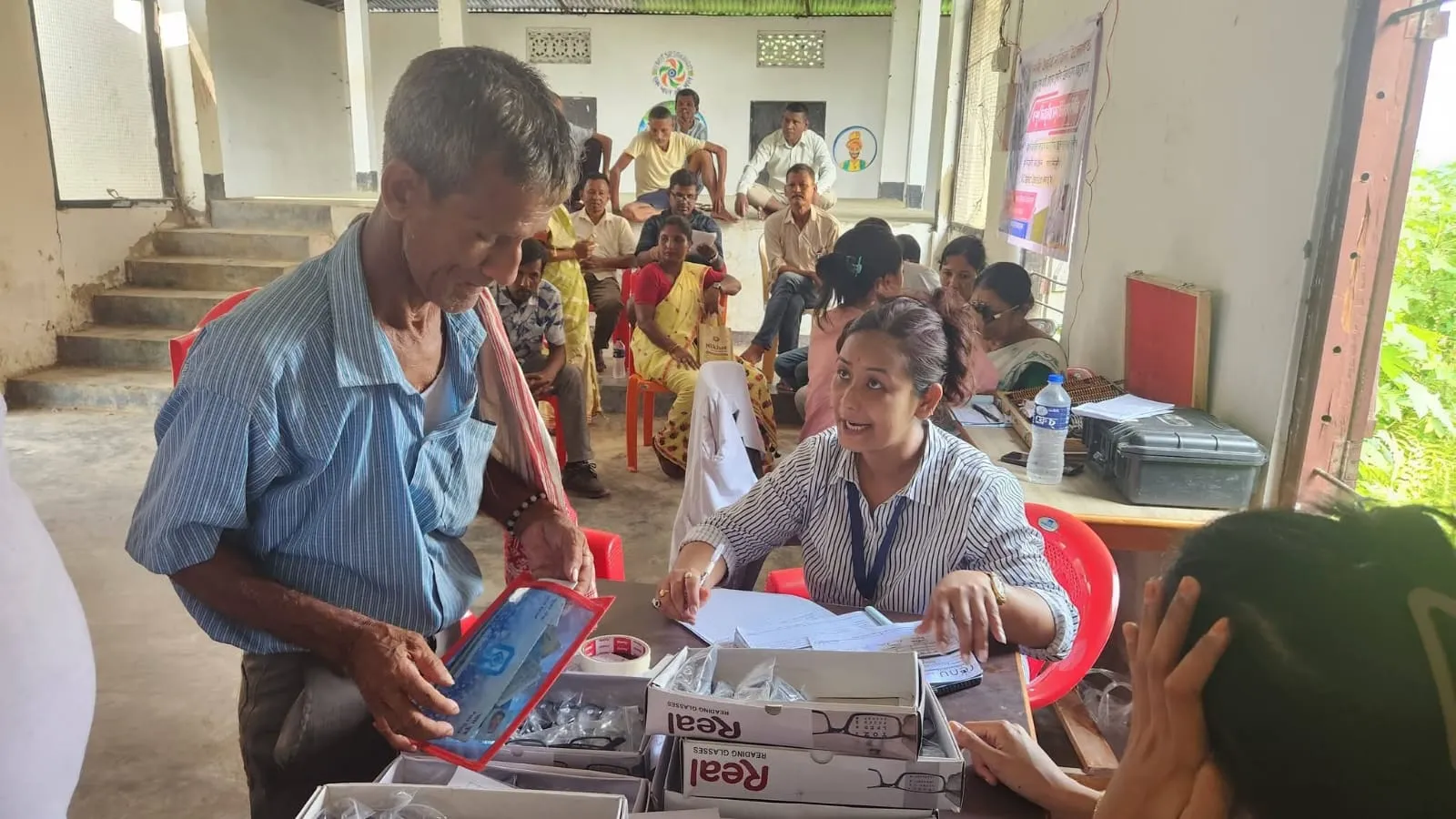 Senior citizens waiting for vision checkups at the camp.
